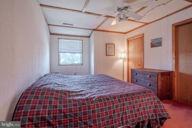 With a little love, this could be your perfect beach getaway! on Bayside Resort Golf Club in Delaware - for sale on GolfHomes.com, golf home, golf lot