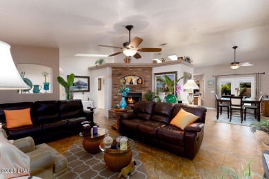 This home checks all the boxes! Total of 5 bedrooms, 4 baths, 3 on London Bridge Golf Course in Arizona - for sale on GolfHomes.com, golf home, golf lot