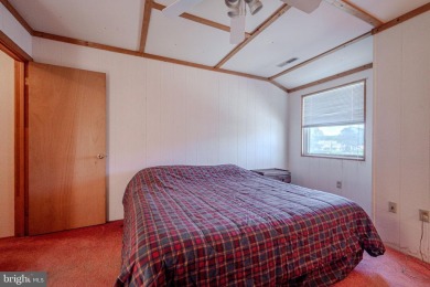 With a little love, this could be your perfect beach getaway! on Bayside Resort Golf Club in Delaware - for sale on GolfHomes.com, golf home, golf lot