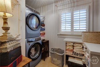 Welcome to 1040 Spy Glass Hill, a beautifully reimagined retreat on Harbor Club Golf and Country Club in Georgia - for sale on GolfHomes.com, golf home, golf lot