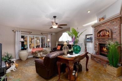 This home checks all the boxes! Total of 5 bedrooms, 4 baths, 3 on London Bridge Golf Course in Arizona - for sale on GolfHomes.com, golf home, golf lot