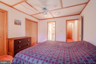 With a little love, this could be your perfect beach getaway! on Bayside Resort Golf Club in Delaware - for sale on GolfHomes.com, golf home, golf lot