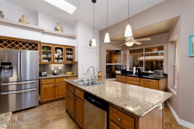 This home checks all the boxes! Total of 5 bedrooms, 4 baths, 3 on London Bridge Golf Course in Arizona - for sale on GolfHomes.com, golf home, golf lot