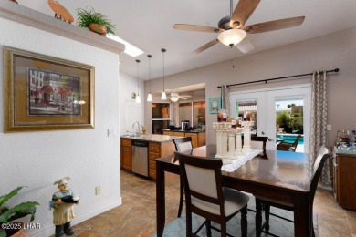 This home checks all the boxes! Total of 5 bedrooms, 4 baths, 3 on London Bridge Golf Course in Arizona - for sale on GolfHomes.com, golf home, golf lot