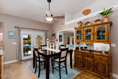 This home checks all the boxes! Total of 5 bedrooms, 4 baths, 3 on London Bridge Golf Course in Arizona - for sale on GolfHomes.com, golf home, golf lot