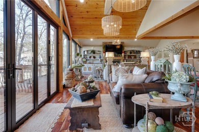 Welcome to 1040 Spy Glass Hill, a beautifully reimagined retreat on Harbor Club Golf and Country Club in Georgia - for sale on GolfHomes.com, golf home, golf lot