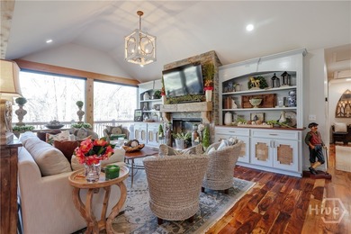 Welcome to 1040 Spy Glass Hill, a beautifully reimagined retreat on Harbor Club Golf and Country Club in Georgia - for sale on GolfHomes.com, golf home, golf lot