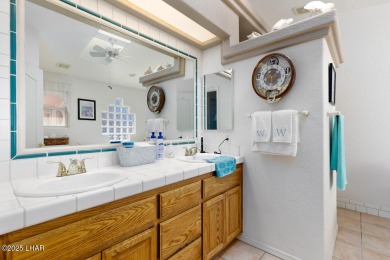 This home checks all the boxes! Total of 5 bedrooms, 4 baths, 3 on London Bridge Golf Course in Arizona - for sale on GolfHomes.com, golf home, golf lot