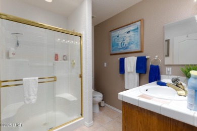 This home checks all the boxes! Total of 5 bedrooms, 4 baths, 3 on London Bridge Golf Course in Arizona - for sale on GolfHomes.com, golf home, golf lot