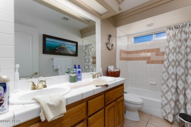 This home checks all the boxes! Total of 5 bedrooms, 4 baths, 3 on London Bridge Golf Course in Arizona - for sale on GolfHomes.com, golf home, golf lot