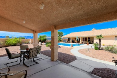 This home checks all the boxes! Total of 5 bedrooms, 4 baths, 3 on London Bridge Golf Course in Arizona - for sale on GolfHomes.com, golf home, golf lot