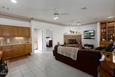 This home checks all the boxes! Total of 5 bedrooms, 4 baths, 3 on London Bridge Golf Course in Arizona - for sale on GolfHomes.com, golf home, golf lot