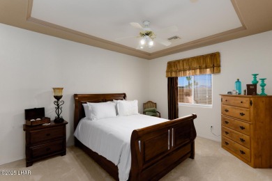 This home checks all the boxes! Total of 5 bedrooms, 4 baths, 3 on London Bridge Golf Course in Arizona - for sale on GolfHomes.com, golf home, golf lot