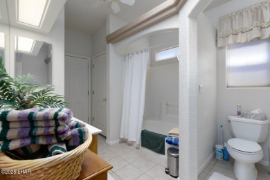 This home checks all the boxes! Total of 5 bedrooms, 4 baths, 3 on London Bridge Golf Course in Arizona - for sale on GolfHomes.com, golf home, golf lot
