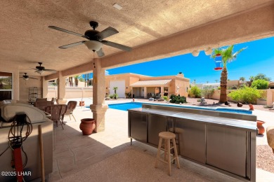 This home checks all the boxes! Total of 5 bedrooms, 4 baths, 3 on London Bridge Golf Course in Arizona - for sale on GolfHomes.com, golf home, golf lot