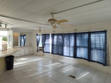 CALLING ALL FLIPPERS**LAKESIDE FIXER UPPER** NEEDS A/C AND A on Vista Plantation Golf Club in Florida - for sale on GolfHomes.com, golf home, golf lot