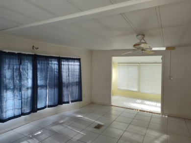 CALLING ALL FLIPPERS**LAKESIDE FIXER UPPER** NEEDS A/C AND A on Vista Plantation Golf Club in Florida - for sale on GolfHomes.com, golf home, golf lot