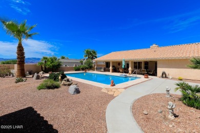 This home checks all the boxes! Total of 5 bedrooms, 4 baths, 3 on London Bridge Golf Course in Arizona - for sale on GolfHomes.com, golf home, golf lot