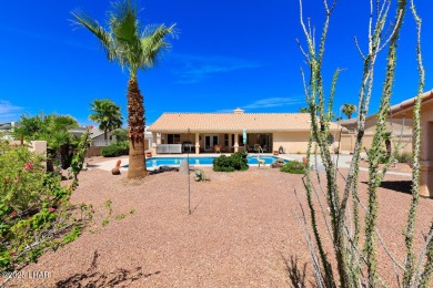 This home checks all the boxes! Total of 5 bedrooms, 4 baths, 3 on London Bridge Golf Course in Arizona - for sale on GolfHomes.com, golf home, golf lot