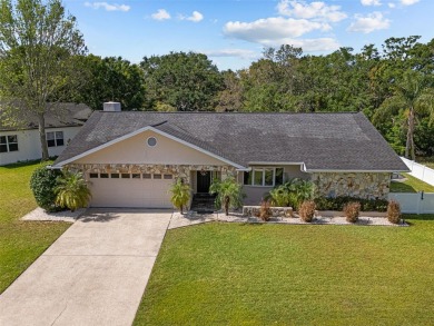 Under contract-accepting backup offers. Welcome to luxury living on East Lake Woodlands Country Club in Florida - for sale on GolfHomes.com, golf home, golf lot