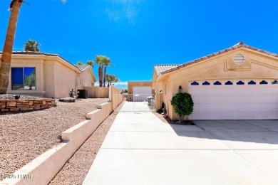 This home checks all the boxes! Total of 5 bedrooms, 4 baths, 3 on London Bridge Golf Course in Arizona - for sale on GolfHomes.com, golf home, golf lot