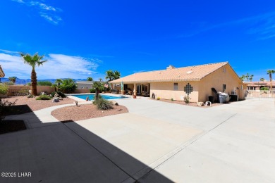 This home checks all the boxes! Total of 5 bedrooms, 4 baths, 3 on London Bridge Golf Course in Arizona - for sale on GolfHomes.com, golf home, golf lot