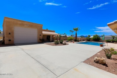This home checks all the boxes! Total of 5 bedrooms, 4 baths, 3 on London Bridge Golf Course in Arizona - for sale on GolfHomes.com, golf home, golf lot
