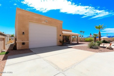 This home checks all the boxes! Total of 5 bedrooms, 4 baths, 3 on London Bridge Golf Course in Arizona - for sale on GolfHomes.com, golf home, golf lot