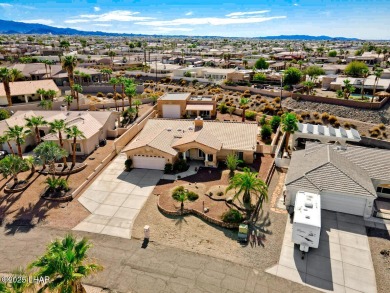 This home checks all the boxes! Total of 5 bedrooms, 4 baths, 3 on London Bridge Golf Course in Arizona - for sale on GolfHomes.com, golf home, golf lot