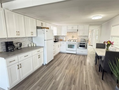 This AWESOME One Bed /One Bath home is a MUST SEE!!  So many on Mangrove Bay Golf Course in Florida - for sale on GolfHomes.com, golf home, golf lot