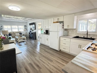 This AWESOME One Bed /One Bath home is a MUST SEE!!  So many on Mangrove Bay Golf Course in Florida - for sale on GolfHomes.com, golf home, golf lot
