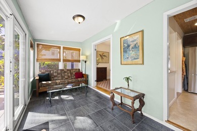 Key West style Cottage in the heart of the Parrot Cove on Lake Worth Municipal Golf Course in Florida - for sale on GolfHomes.com, golf home, golf lot