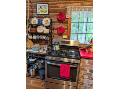 This impeccably maintained, climate-controlled, historic Log on Lucerne In Maine Golf Course in Maine - for sale on GolfHomes.com, golf home, golf lot