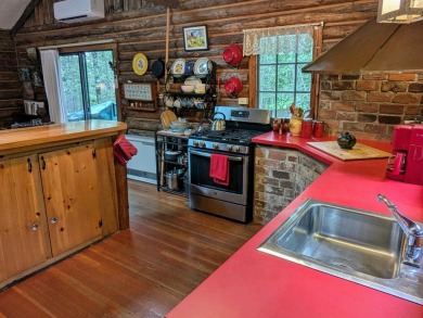 This impeccably maintained, climate-controlled, historic Log on Lucerne In Maine Golf Course in Maine - for sale on GolfHomes.com, golf home, golf lot