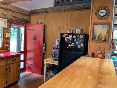 This impeccably maintained, climate-controlled, historic Log on Lucerne In Maine Golf Course in Maine - for sale on GolfHomes.com, golf home, golf lot
