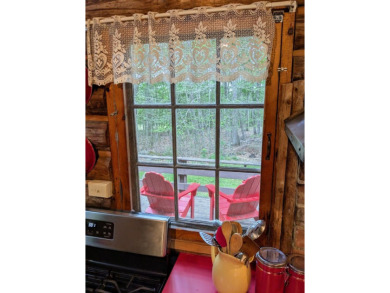 This impeccably maintained, climate-controlled, historic Log on Lucerne In Maine Golf Course in Maine - for sale on GolfHomes.com, golf home, golf lot