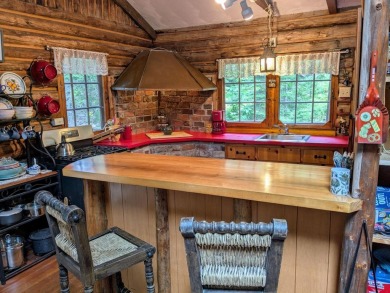 This impeccably maintained, climate-controlled, historic Log on Lucerne In Maine Golf Course in Maine - for sale on GolfHomes.com, golf home, golf lot