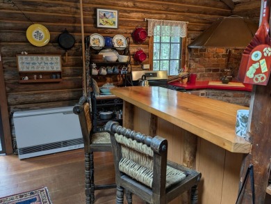 This impeccably maintained, climate-controlled, historic Log on Lucerne In Maine Golf Course in Maine - for sale on GolfHomes.com, golf home, golf lot