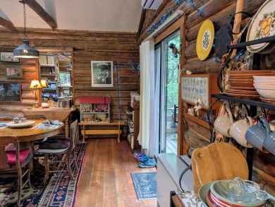 This impeccably maintained, climate-controlled, historic Log on Lucerne In Maine Golf Course in Maine - for sale on GolfHomes.com, golf home, golf lot