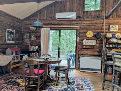 This impeccably maintained, climate-controlled, historic Log on Lucerne In Maine Golf Course in Maine - for sale on GolfHomes.com, golf home, golf lot