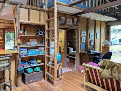 This impeccably maintained, climate-controlled, historic Log on Lucerne In Maine Golf Course in Maine - for sale on GolfHomes.com, golf home, golf lot