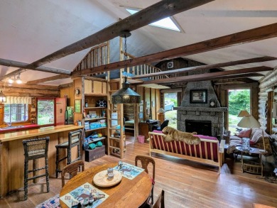 This impeccably maintained, climate-controlled, historic Log on Lucerne In Maine Golf Course in Maine - for sale on GolfHomes.com, golf home, golf lot