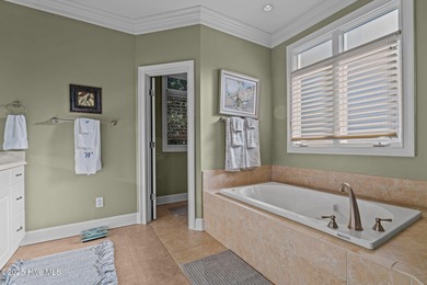 Experience resort-style living every day in this immaculate on Forest Creek Golf Club  in North Carolina - for sale on GolfHomes.com, golf home, golf lot