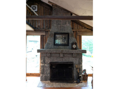 This impeccably maintained, climate-controlled, historic Log on Lucerne In Maine Golf Course in Maine - for sale on GolfHomes.com, golf home, golf lot