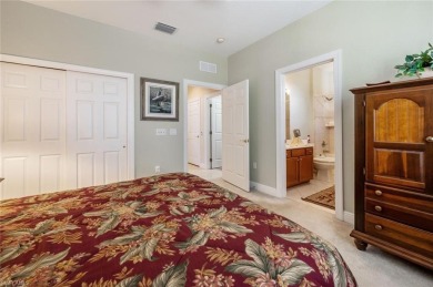 Experience luxury living in this spacious second-floor end unit on Naples Lakes Country Club in Florida - for sale on GolfHomes.com, golf home, golf lot