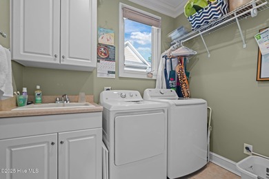 Experience resort-style living every day in this immaculate on Forest Creek Golf Club  in North Carolina - for sale on GolfHomes.com, golf home, golf lot