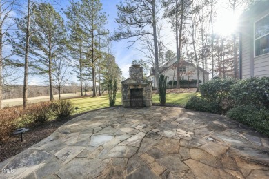 This exceptional home offers luxury living in one of the on Hasentree Club in North Carolina - for sale on GolfHomes.com, golf home, golf lot