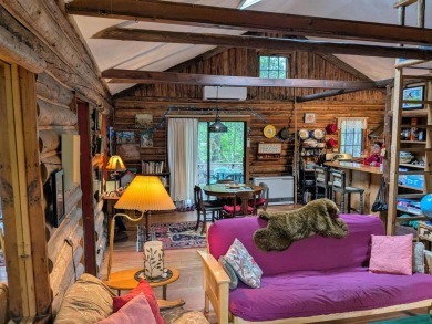 This impeccably maintained, climate-controlled, historic Log on Lucerne In Maine Golf Course in Maine - for sale on GolfHomes.com, golf home, golf lot