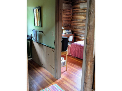 This impeccably maintained, climate-controlled, historic Log on Lucerne In Maine Golf Course in Maine - for sale on GolfHomes.com, golf home, golf lot