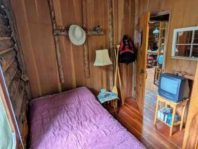 This impeccably maintained, climate-controlled, historic Log on Lucerne In Maine Golf Course in Maine - for sale on GolfHomes.com, golf home, golf lot
